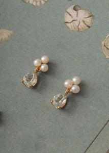 Perleøreringe fra carré jewellery på udsalg lige nu